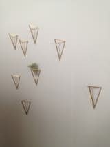We really loved these little triangle wall decorations in Melina Raissnia's space, though sadly their was source was not to be found.