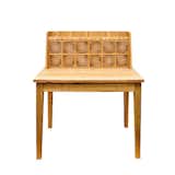 WRITING DESK WITH HUTCH

The natural grain and graphic patterns of reclaimed wood give Tom Ptacek's handcrafted furniture a unique design fingerprint. This heart pine writing desk with hutch has a series of rings that will keep you visually stimulated while you do your work.