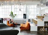 New York firm MCDC designed littleBits’s Chelsea office, which is outfitted with Togo sofas from Ligne Roset and an overhead fixture by Tech Lighting. The shelves hold books and play materials like Legos and K’nex.