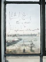 The windows of the company's office are covered with sketches.