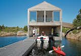 Make it float!

On the edge of a tiny island on Lake Huron, accessible only by boat, this buoyant summer home lives the life aquatic.