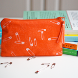 ZIPPERED POUCH

Spice up your DIY skills using the light sensitive dye Inkodye. The sun-activated dye can be used on textiles, wood, and any natural fiber. Just one of the many Inkodye-based projects, this fabric zipper pouch is a great gift for all ages.