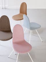 Fabric options include light pink, mint blue, ochre, and sand.  Search “back production tongue chair arne jacobsen” from Back in Production: The Tongue Chair by Arne Jacobsen
