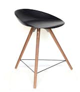 A refreshing alternative to the ever-popular Eames chair, the Vienna is a 3-legged stool composed of a sculptural (yet comfortable!) metal seat shell and walnut wood legs. Available in various colors.  Search “diningfurniture--stools” from Design Studio We Love: Atelier Areti