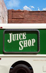 Detail of the service window. The retro sign was handpainted by New Bohemia Signs.

Photo by: Meg Haywood-Sullivan  Photo 2 of 9 in Freshly Squeezed: Mobile Juice Truck Makes Its Debut