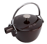 This Staub teapot is a distinct aubergine color and modern Japanese design. The cast-iron construction of the pot ensures a quick boil for your water.  Search “glass-teapot-with-infuser.html” from Stylish Modern Teapots
