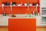 Different designs from the collection pair effortlessly. This kitchen sports restrained Créme Lacquered Linen as well as vivid Orange Greek Key laminates.  Photo 3 of 6 in kitchen inspiration by Diellza from The Formica Corporation and Jonathan Adler Collaborate on a New Line of Vibrant Laminates