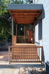 A cedar deck and beams create the transition to the back entry.

Photo by: Eric Hausman Photography  Photo 7 of 8 in Sustainable Living: Chicago’s First Certified Passive House
