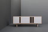 Graft Sideboard: "Strong and stable, the Graft sideboard offers concealed and open storage, finished in soft tones of grey laminate and natural unfinished oak timber. The unit has two solid oak drawers with concealed drawer runners and two adjustable shelved compartments," says Welsh. ($3,557)