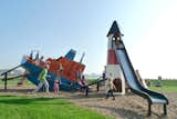 The Cargoship playground in Höganäs, Sweden, was developed in collaboration with the municipality as part of a general renovation of the area. It’s theme, with a sunken ship, lighthouse and fish, is designed to fit into the maritime environment.  Photo 5 of 8 in Imaginative Playgrounds by Monstrum