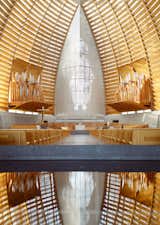 Oakland's Cathedral of Light, designed by SOM, is just a single-story building, but the gracious curves showcase the artistry possible with taller wooden structures. Reaching a height of 136 feet, the wood-and-glass sanctuary exudes a calming presence.