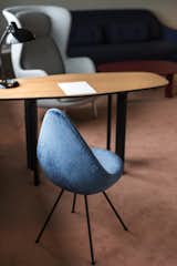 A limited number of Drop chairs were made for the hotel, then production ceased. In 2014, Fritz Hansen revived the design. Hayon upholstered this particular one with bold, blue fur.