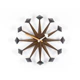 A classic midcentury clock, the Nelson Polygon Clock features walnut spindles that end in hardwood polygon shapes.