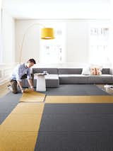 "Unlike traditional broadloom and area rugs, we’re a modular system that allows you to create custom rugs, runners, and wall-to-wall designs to fit any size and shape," senior designer Cristina Englund says. "With broadloom rugs, you have to replace whole sections of a rug at a time, but with FLOR you can pick up one square and clean it in the sink."  Photo 1 of 6 in Ditch the Area Rug: This Easy, Modular Carpet System Has Serious Green Cred by Allie Weiss