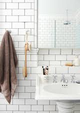 Bath Room, Pedestal Sink, and Subway Tile Wall The Sydney home of Leanne Carter-Taylor and Trent Carter-Brugman via the Design Files.  Photo 9 of 24 in Bathroom by Marc Schoonover from Australian Homes from the Design Files