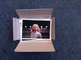 The open package of little photos by Chantal Heijnen.