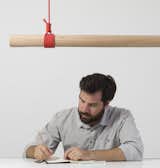 Chilean designer Matias Ruiz Malbran, who creates pieces as a partner in design firm Ruizsolar, based in Santiago. His piece, Stick Lamp L120 is an LED-illuminated piece comprised of Chilean Lenga wood and colorful rope.