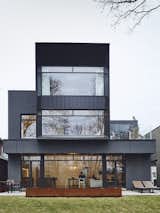 The front facade features Cor-Ten steel fabricated by Praxy Cladding.  Search “how boxy would you go look modern box homes” from House of the Week: High-Tech Metal House Turns Heads in Toronto