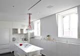 In-ceiling speakers were used to flood the kitchen of a New York City apartment with music.