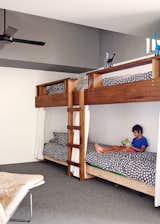 Made from Tasmanian oak, the bunk beds, covered in Kivet duvets by Marimekko, can accommodate four.