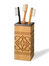 BAMBOO BASKET TOOTHBRUSH HOLDER

Part of the same collection as the Bamboo Basket Lotion Pump, the Native American-inspired geometrics on this toothbrush holder are also laser-engraved on eco-friendly bamboo. We think it would also look great on a desk and filled with pens and pencils.