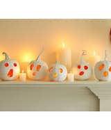 No need for plastic skulls and spiders. Go clean and simple while still perfectly spooky with all white jack-o-lanterns and candles.

Pinned by Linda Watkins

"all white jack-o-lanterns and candles...great effect"

via familyholiday.net   from halloween