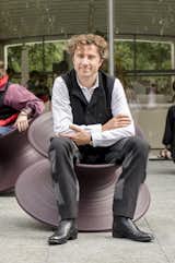 Thomas Heatherwick seated in the Spun chair he designed in 2010. Made from rotational moulded polyethylene, it's designed by a single profile rotated 360 degrees around an axis.  Photo 1 of 10 in Q&A With British Designer Thomas Heatherwick