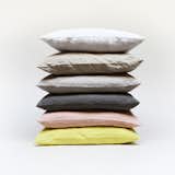 The Stone-Washed Linen Throw Pillow Cover from Hawkins New York represents an expert blend of casual comfort and luxurious materiality. Made of European linen, each pillow cover is piece dyed and stone washed, which creates an extremely soft touch and smooth finish. The generously sized cover can be used in a variety of spaces, including adding softness to a bed, enhancing the look of a sofa or chair, and creating a cozy reading nook in a home office. Available in several soft colors, the throw pillow covers can be mixed and matched with each other, combined to create a monochrome palette, or used individually.  Photo 4 of 10 in New Designs at the Dwell Store by Marianne Colahan