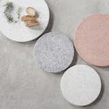 The Terrazzo Platter from Serax is a sophisticated kitchenware accent, and can be used as a serving tray, board for cheese and charcuterie, or even as a centerpiece on a dining room table—it can present tea lights, a vase of flowers, or center another accent. Terrazzo is a composite material that is available in a range of colors and tones and features a distinctive speckling. The material is both striking and simple, making it an excellent choice for different decors. On a wood table, the platter will provide material interest, while on a stone counter, the platter creates a subtle contrast. Available in two sizes and tones, the Terrazzo Platter is a simple and refined serveware piece.  Photo 10 of 10 in New Designs at the Dwell Store by Marianne Colahan