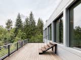 The large terrace on the upper level, which contains the house's bedrooms, is nearly 968 square feet.  Search “large kartio tumbler set of 2 clear” from Striking Cantilevered Home Pairs Brick and Aluminum