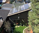 Chicago Net Positive Home (Kipnis Architecture + Planning)

The home manages a net zero rating thanks to a grid of solar panels mounted on the garage, which generates enough power to take care of the home’s electricity needs and charge an electric car and hot tub on the roof.