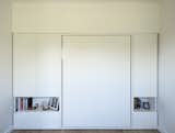 The couple’s Murphy bed, Clei’s Penelope model, folds up into the wall.