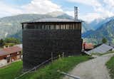 Last but not least is Swiss architect Peter Zumthor's St. Benedict Chapel, built in 1988 before Zumthor's rise to international renown. Its shingles have weathered to a dark hue, creating remarkable dark-to-light gradients in some areas.