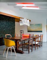 dining room table and chairs with pendant lighting