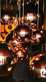 The firm Studio Roca curated a collection of lamps by Tom Dixon.