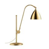 The Bestlite series from Gubi has been in continuous production since the 1930s, proving that its silhouette and construction are timeless elements that complement both traditional and modern interiors. This all-brass version of the classic Bestlite BL1 Table Lamp is an undeniable statement maker. It is also available in brass with powder-coated shades and chrome options.  Photo 7 of 7 in Modern Brass Lights We Love by Marianne Colahan