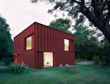 Driven by data found on the site, the architects decided to merge the traditional red wooden cottage archetype with the modern box home.