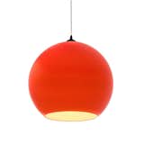 FLUORO SHADE

Though it looks like Flouro's polycarbonate shade could illuminate a room on it's own, it is, indeed, fitted for a bulb. Tom Dixon is quite fond of the eye-catching color, and it can be found on handful of other items in his collection.