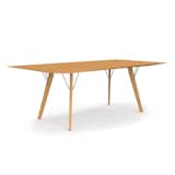 The Skyline Dining Table from Seattle-based Hallbanger takes a minimalist silhouette and pairs it with interesting material details. Available in different wood finishes including maple, walnut, white oak, soaped ash, and black ash, the table features a simple tabletop that is connected to four flared table legs with chrome, brass, or powder-coated metal.