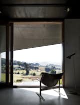 A Clement Meadmore Sling chair provides a favorite vantage point for sipping coffee while looking out at Hanging Rock. “It’s always hard to leave and return to the city,” Titania says.