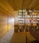 The library is accessed by a sliding wood door.