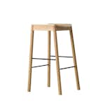 From New Zealand–based Resident, the Tangerine Stool is crafted from solid oak, but it is lightweight and has a streamlined look. In contrast with the light wood finish, the Tangerine Stool features steel crossbars that can also be used as foot rests.