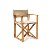 The Kryss Chair was designed for the Swedish Embassy in 1975 and features a foldable teak frame and a fabric seat and back. The inspiration for the chair is from the discovery of folding chairs in King Tut’s ancient tomb. It can be used in both indoor and outdoor settings.  Search “voice art canvas” from Modern Takes on Folding Chairs