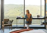 Working with a limited footprint, a daunting slope, and killer views, architect Bruce Bolander went vertical with a secluded canyon house in Malibu. He designed the custom steel desk as well as the bedside table, fashioned from a speaker tower base and a slab of white oak.
