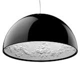 Skygarden Suspension Lamp (2007) by Marcel Wanders, estimated at $1,000–$1,500. From designer Marcel Wanders, the Skygarden S suspension lamp features a glossy black hemisphere encircling mechanically-drawn motifs from 18th-century French Rococo on a white plaster surface.