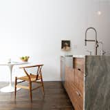 Earthy details meet minimalist angularity in the kitchen. Consentino countertops play to both styles.