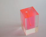 A neon acrylic vase by Japanese designer Shiro Kuramata.