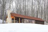 The father of architect Greg Dutton wished to build a cabin on the family farm, located within Appalachian Ohio and home to 400 heads of cattle. Dutton, of Pittsburgh and Columbus, Ohio-based Midland Architecture, presented this design as his father’s birthday present in 2012. Finished in 2014, the 900-square-foot cabin operates entirely off-the-grid.