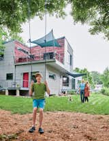 Since Dwell’s first visit in 2006, Gary—now 14 years old—has outgrown the swing, and the home has seen a few final updates: The second-floor deck is now covered in reused barn wood, and the terraces have been finished with railings, awnings, and recycled plastic decking.