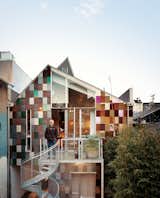 A few years before we visited his remodeled Edwardian home in 2008, architect David Baker planted an outdoor screen of bamboo that, thanks to diverted rainwater and greywater, now towers over and even obscures some of his handiwork on the rear facade—a colorful patchwork of recycled shingles.